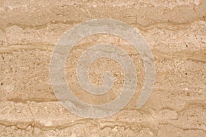 Beautiful background of natural stone marble beige, called Travertino Alabastrino photo