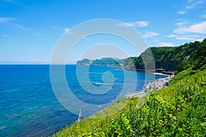 Beautiful background scenic seaside road with blue sky sunny day the way to Otaru, Hokkaido Japan photo