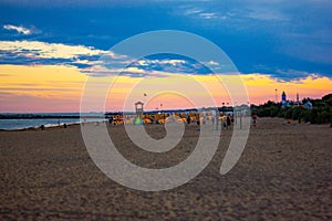 Beautiful background. sunset on the beaches of Jesolo, a town by now super organized to make its tourists happy.