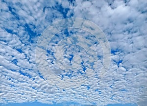 Beautiful background of white cloud cover on blue sky