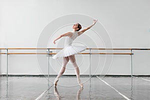 Beautiful ballerina rehearsal in ballet class photo