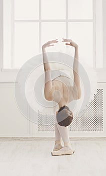 Beautiful ballerine dance in ballet position, reverence photo