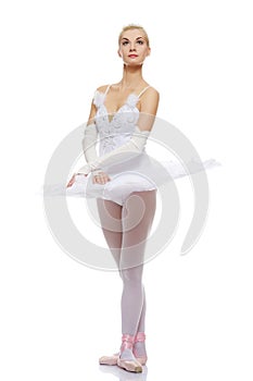 Beautiful ballet dancer isolated on white