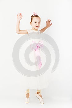 Beautiful ballet dancer isolated on white background.