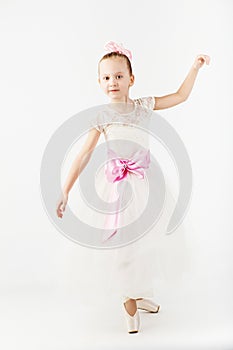 Beautiful ballet dancer isolated on white background.