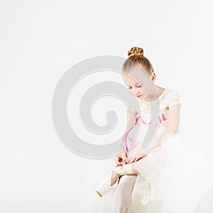 Beautiful ballet dancer isolated on white background.