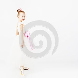 Beautiful ballet dancer isolated on white background.