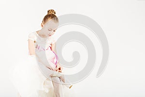 Beautiful ballet dancer isolated on white background.