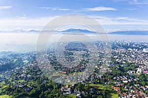 Beautiful Bandung cityscape with crowd houses photo