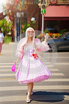 Beautiful barbie girl walking around the city