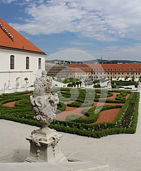 Beautiful baroque garden with ornamental bushes cut to shapes and antique sculptures at Bratislava castle