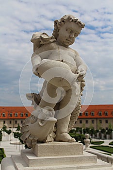 Beautiful baroque garden - an ornamental sculpture of an angel