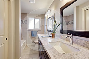 Beautiful bathroom with tile floor.