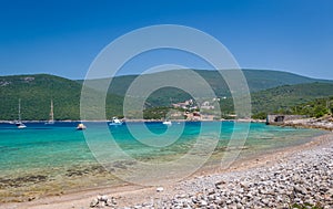 Beautiful bay of Adriatic sea with recreational boats at anchor