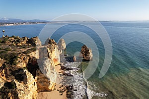 Beautiful bay near Lagos town, Algarve region, Portugal. Sandy beach. Portuguese landmark, popular travel destination