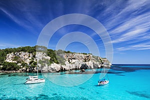 Beautiful bay with sail boats, Menorca island, Spain. Sailing and yachting concept