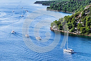 Beautiful bay with sailing boats, Croatia. Yachting sail boats near the croatian islands.