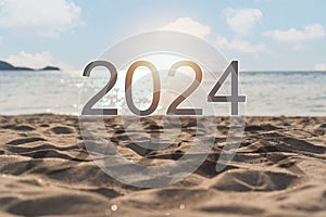 Beautiful beach with 2024 and shadow. Copy space for text. New year 2024 concept