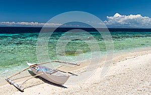 Beautiful beach against seaview with boat at Balicasag island photo