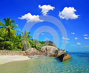 Beautiful beach Anse Source d`Argent with big granite rocks in sunny day. La Digue Island, Indian Ocean, Seychelles.