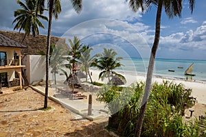 Beautiful beach. Beach furniture on the beach. Paradise vacation.