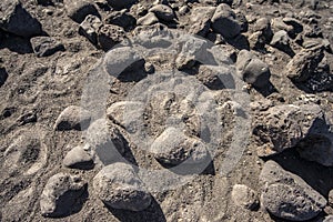 The beautiful beach of black and dark stones