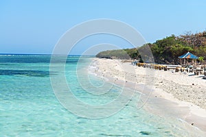 Beautiful beach with blue clean water and cafe