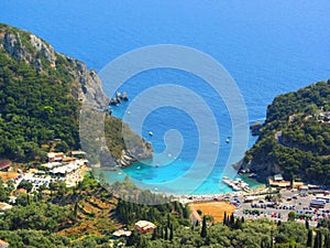 Beautiful beach and boat in Paleokastritsa, Corfu island, Greece