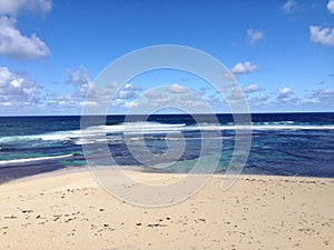 Beautiful beach with calm blue ocean and open sky