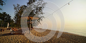 Beautiful beach. Chairs on the sandy beach near the sea. Summer holiday