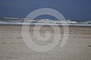 Beautiful beach with clean sky and waves and white sand