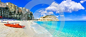 Beautiful beach and houses in Tropea village,Calabria. photo