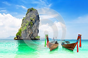 Beautiful beach of Koh Poda island with thai traditional wooden longtail boat in Krabi province, Thailand