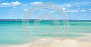 Beautiful beach landscape and horizon under cloudy blue sky copy space with calm and tranquil ocean scenery. A sea with