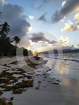 A beautiful beach landscape with mountains. Un hermoso paisaje de playa con montaÃÂ±as. photo