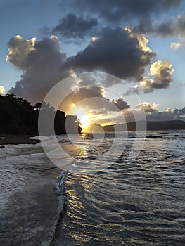 A beautiful beach landscape with mountains. Un hermoso paisaje de playa con montaÃÂ±as. photo