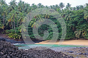 The beautiful beach Piscina in island of Sao Tome and Principe-