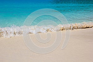 Beautiful beach with pristine turquoise water in Conflict Island, Papua New Guinea