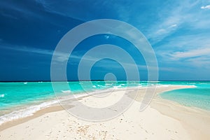 Beautiful beach with sandspit at Maldives photo