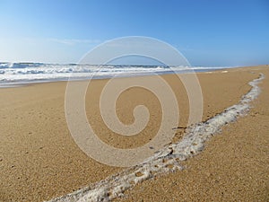 Beautiful beach with the sea and its heat waves sun sky water salt air photo