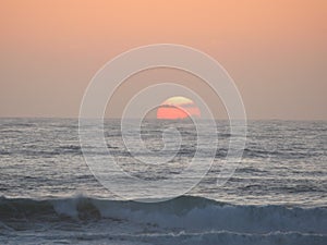 Beautiful beach with the sea and its heat waves sun sky water salt air photo