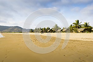 Beautiful beach and tropical beach cottage photo