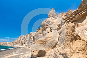 Beautiful beach with volcanic mountains. Vlychada beach, Santorini island