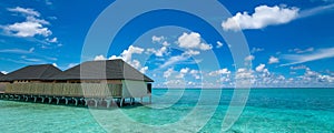 Beautiful beach with water bungalows at Maldives