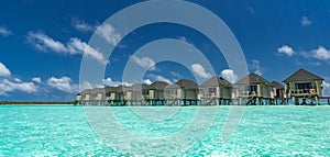 Beautiful beach with water bungalows at Maldives