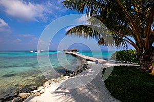 Beautiful beach with water bungalows at Maldives.