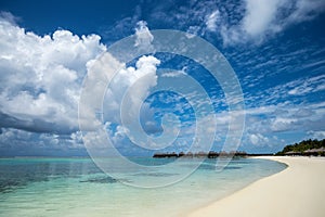 Beautiful beach with water bungalows at Maldives