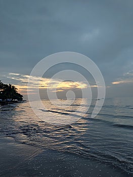 Beautiful beach, wave, and blue sky. Perfect time to rest