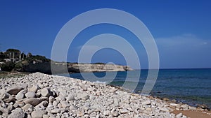 Beautiful beach with white rocks on the coastline in Caponegro Contrada, near Avola city, Sicily
