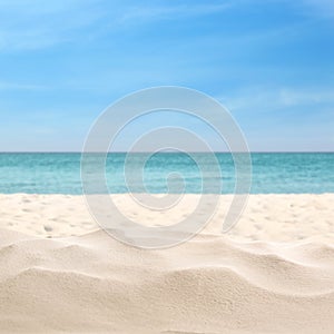 Beautiful beach with white sand near ocean, closeup